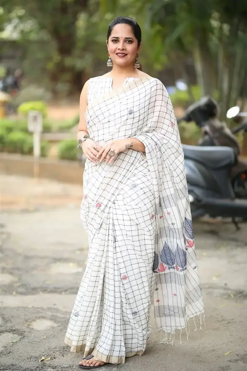 Anasuya Bharadwaj in White Saree at Razakar Movie Launch